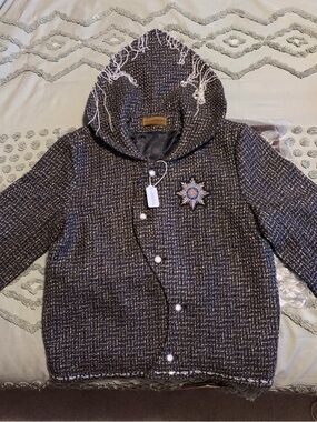 BIRTH OF A ROYAL CHILD coat 490$ retail